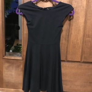 Black dress , little open in back with bow